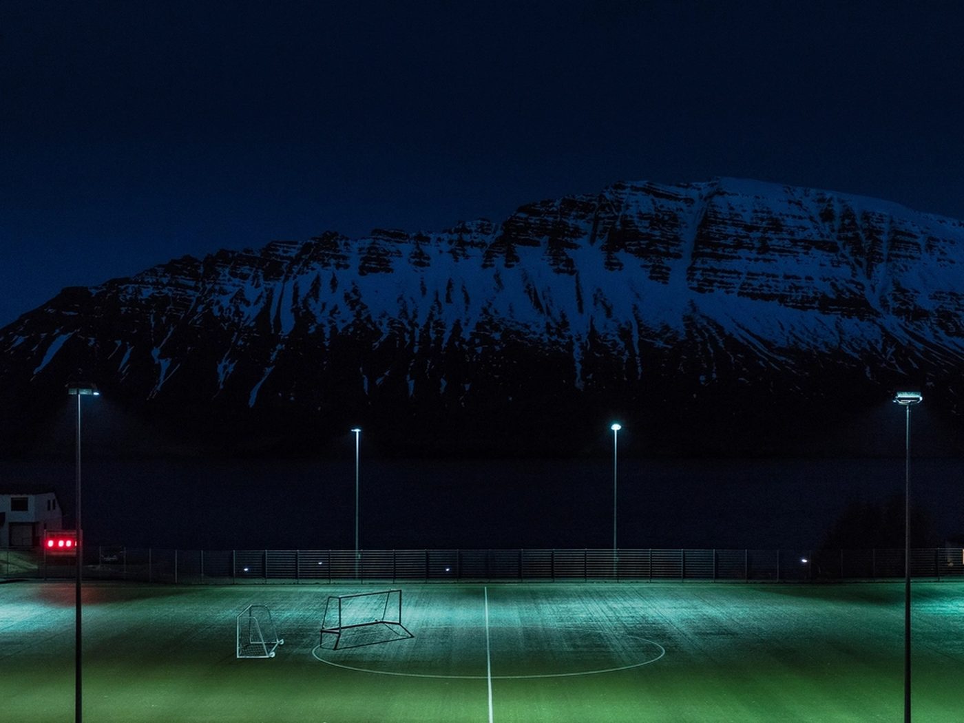 Football photo: turf pitch at night